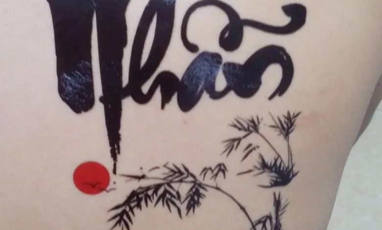 vMẫu hình xăm chữ Nhẫn kết hợp hoa văn nghệ thuật